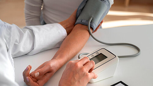 Blood pressure being taken